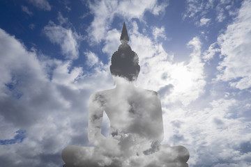 Abstract insert sky in image of Buddha with blue sky and cloud in background,filtered image , prachuapkhirikhan,thailand