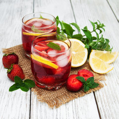 Glasses of lemonade with strawberries