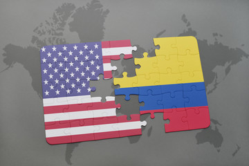 puzzle with the national flag of united states of america and colombia on a world map background