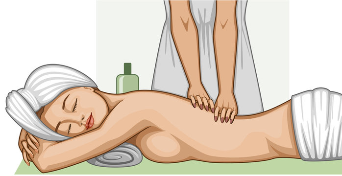 A relaxed woman in towels lying on her stomach having a back massage