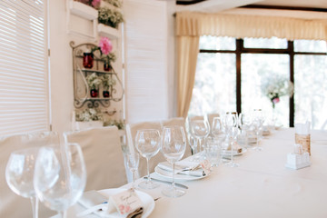 Elegant table arrangement and catering at wedding reception. Wedding decoration in restaurant