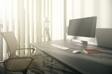 Workplace with blank computer