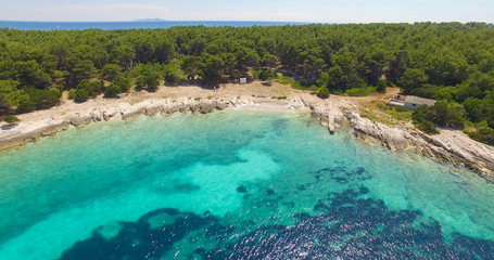Fototapeta na wymiar Proizd beach near dalmatian Island of Korcula ,Croatia.Beautiful peaceful island with crystal clear sea full of wildlife.Active summer diving location. Aerial view on beautiful beach.