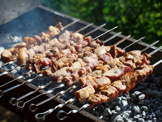Cooking meat on the fire.