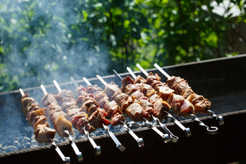 Cooking meat on the fire.