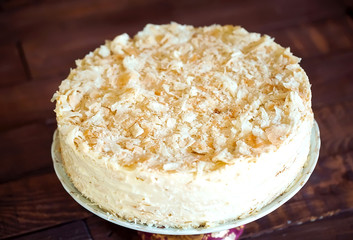 Napoleon cake on vintage wooden background