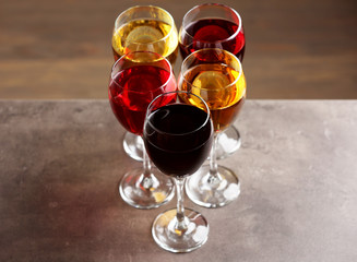 Glasses with wines of different colors on a table