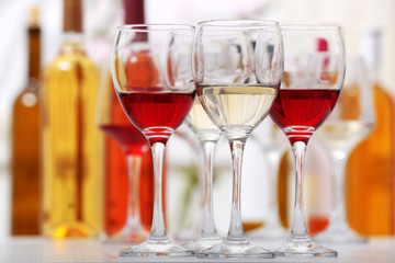 Wine glasses with red and white wine, closeup