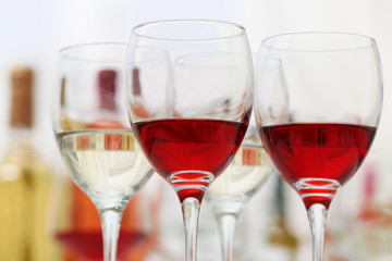 Wine glasses with red and white wine, closeup