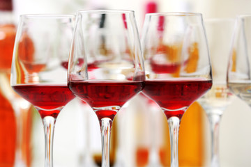 Wine glasses with red and white wine, closeup
