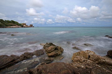 ocean waves crashing rocks