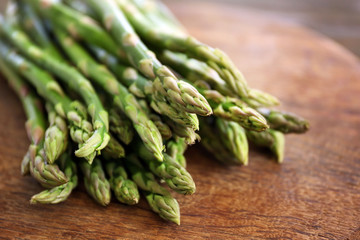 Asparagus on wooden table