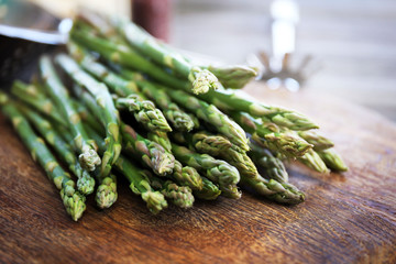 Asparagus on wooden table