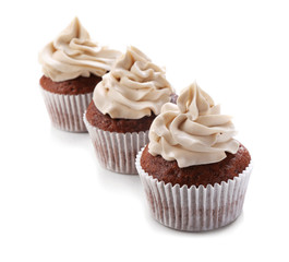 Tasty chocolate cupcakes, isolated on white