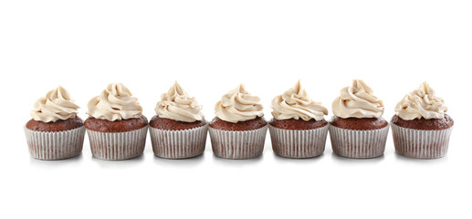 Tasty chocolate cupcakes, isolated on white