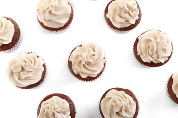 Tasty chocolate cupcakes, isolated on white