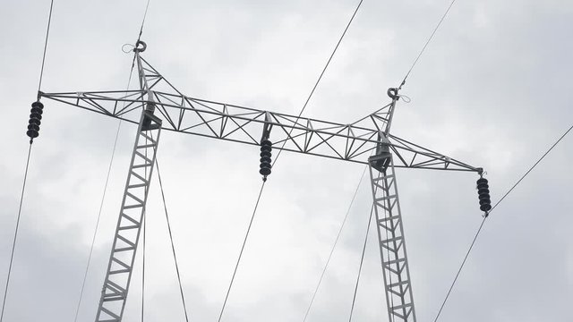 Electric energy transmission line pole 4K 2160p UHD footage - Power transmission metal construction and wires 4K 3840x2160 UHD video 