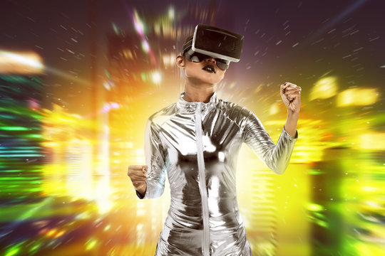 Pretty asian woman wearing silver latex jumpsuit and VR headset inside virtual world