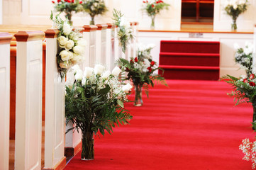 Fototapeta na wymiar red carpet in church for wedding ceremony