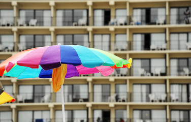sun umbrella in front of hotel building