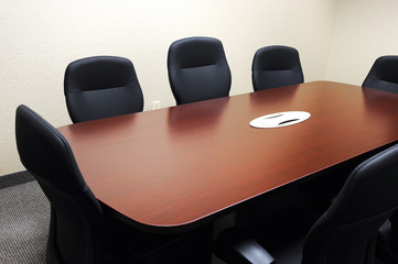 table, chairs in meeting room