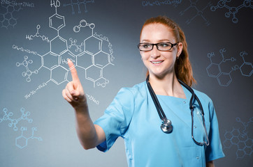 Female doctor with set of abstract elements