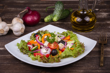 Fresh vegetable greek salad on the table