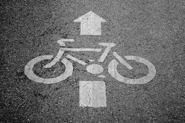 bicycles sign on bicycle pathway in the park
