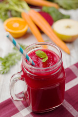 Vegetable and fruit cocktail, served in a jar, with fresh beets,