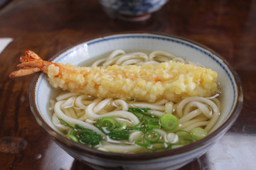Japanese noodle called Udon with deep fried shrimp or tempura