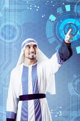 Arab man pressing virtual buttons in futuristic concept