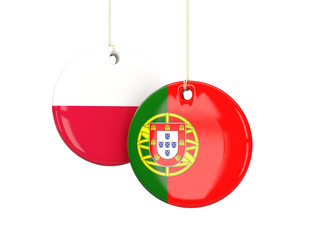 Obraz premium Poland and Portugal soccer teams round labes