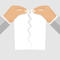 Fototapeta premium Male hands tearing sheet