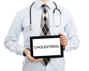 Doctor holding tablet - Cholesterol