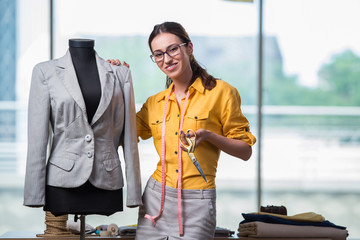 Woman tailor working on new clothing