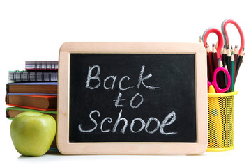wooden plaque with the inscription "back to school" near the pencil box with school equipment and Apple with stack of books and notebooks on white background isolated
