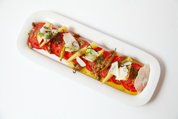 Fresh Caprese salad isolated on white