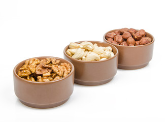 nuts in ceramic bowls