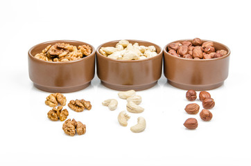 nuts in ceramic bowls
