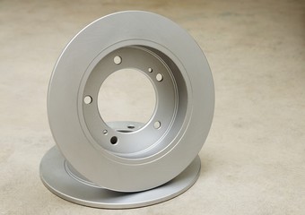 New brake disc on a white background