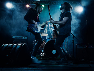 Fototapeta na wymiar Rock band performs on stage.