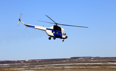 Fototapeta na wymiar helicopter takeoff