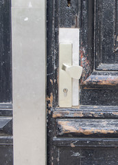 Door lock at an old wooden door