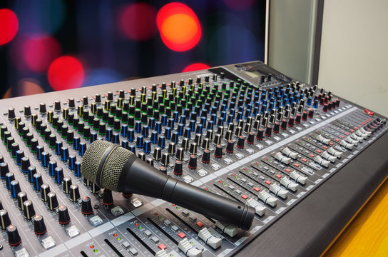 Microphone on mixer board.