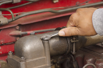 Man mechanic working repair engine suitable for background man working or background engine or...