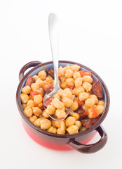 aereal view metal pot with chickpea stew with sausage