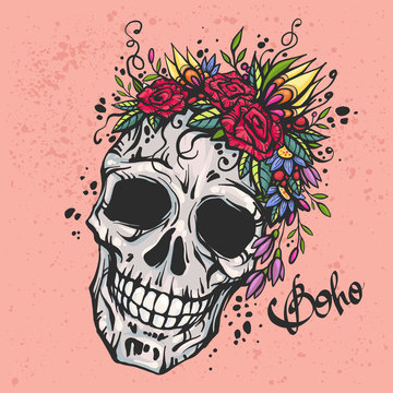 Human skull with flower wreath