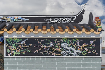 Oriental relief painting in Chinese temple in Hong Kong