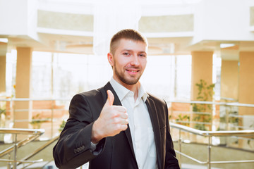 Fototapeta premium Young businessman in the office
