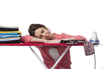 Young woman doing ironing isolated on white
